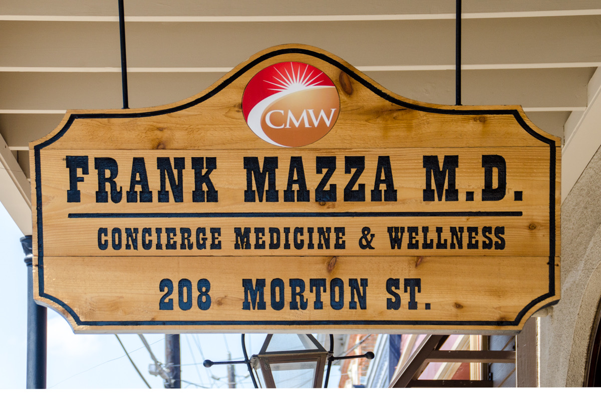 Concierge Medicine & Wellness office sign at 208 Morton St