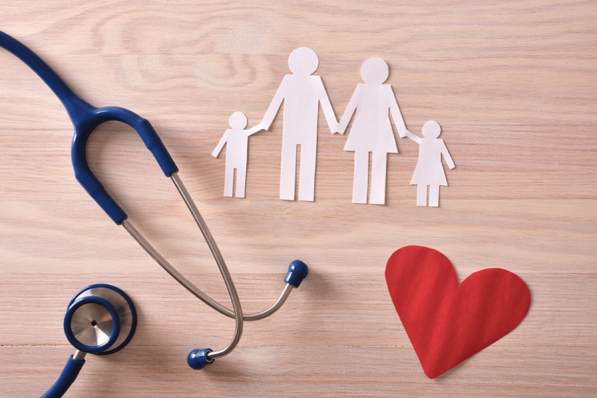 Family medicine — stethoscope with paper family cutout